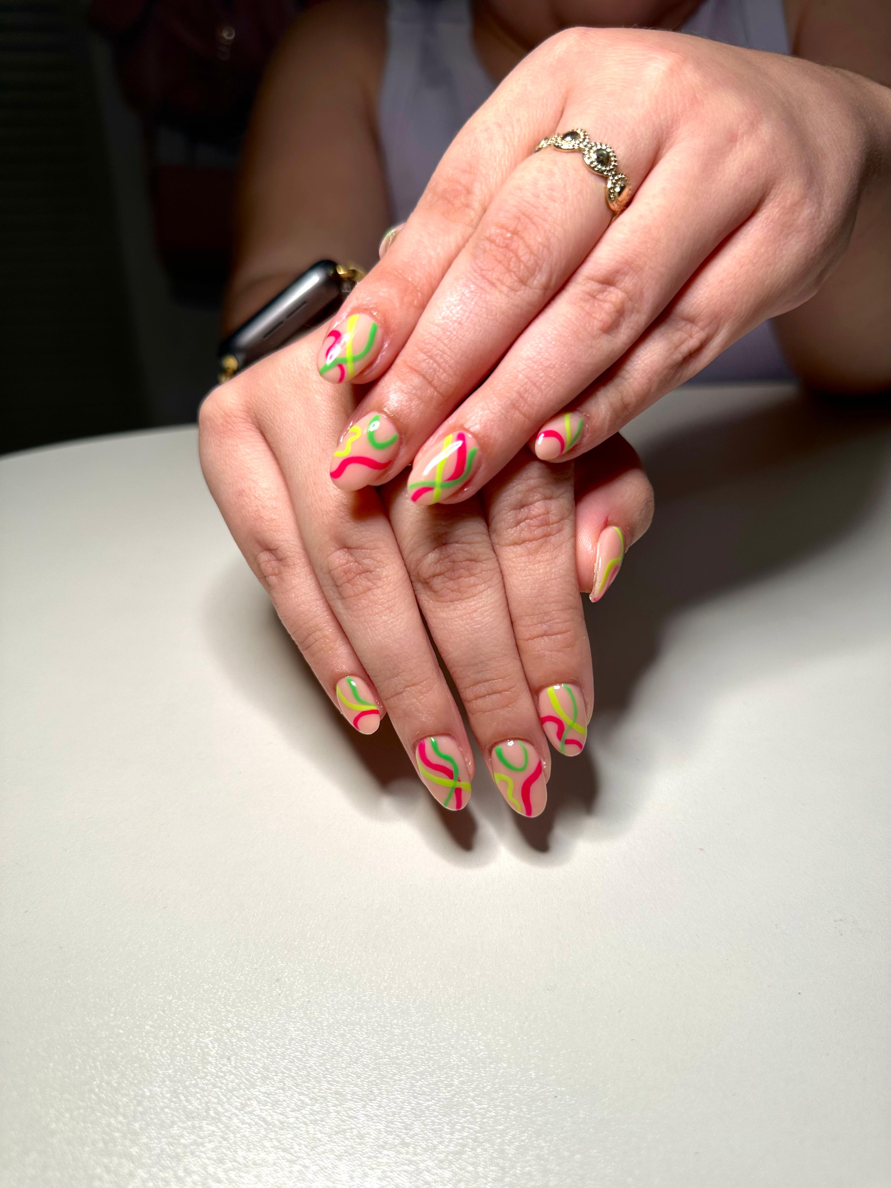 Colorful stripes nail art.